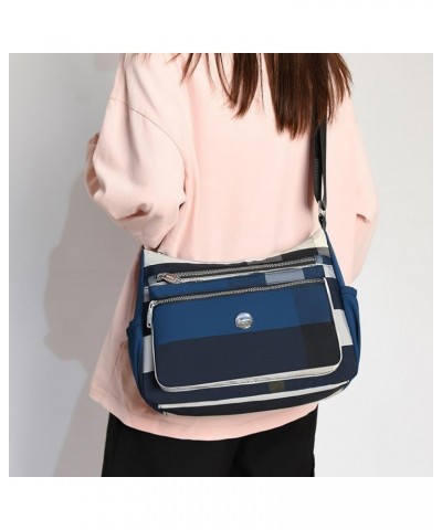 Plaid children's bag, nylon cloth small bag, shoulder bag, women's cross-body dumpling bag Dark Blue $26.50 Shoulder Bags